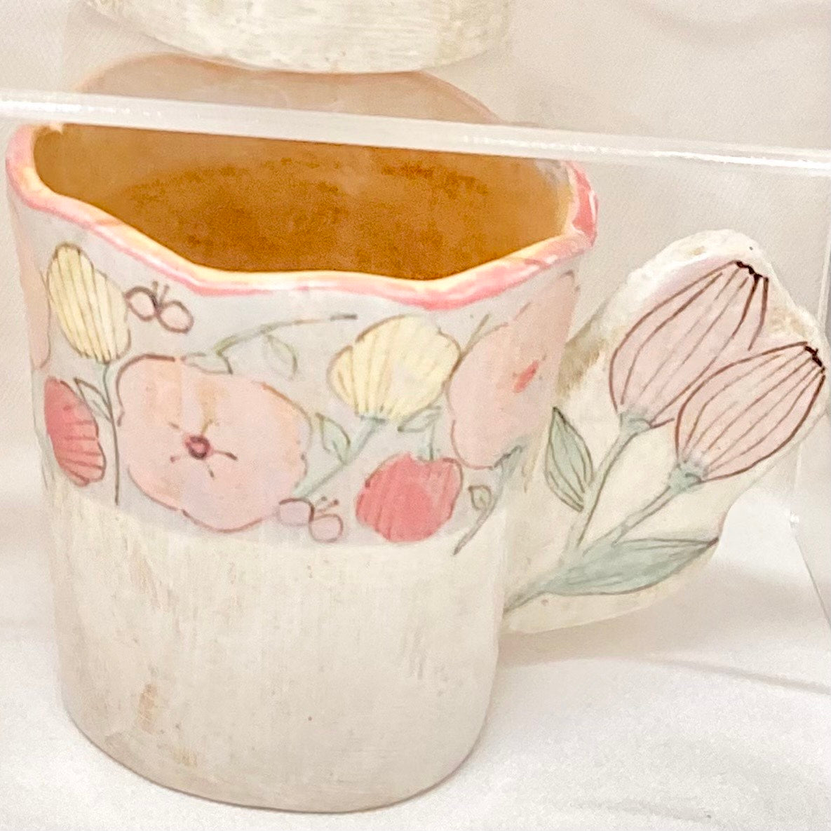 the cozy nook 長方形．取っ手が花のマグカップ